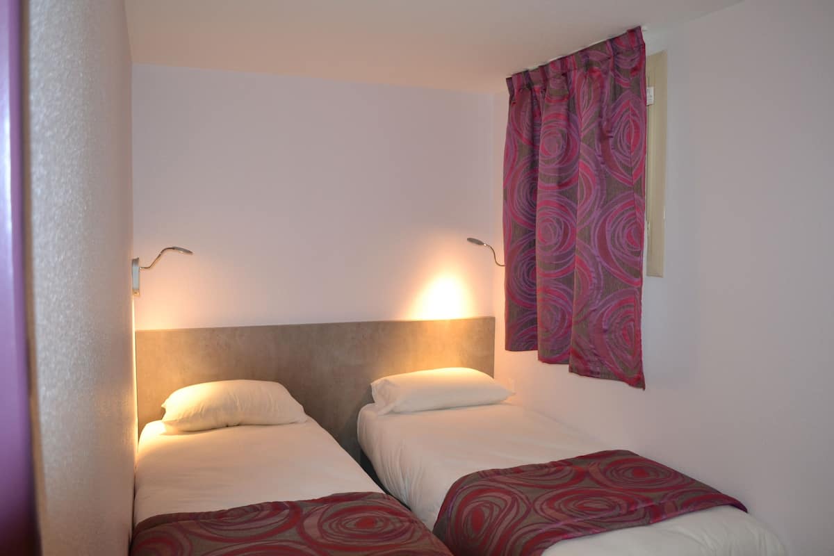 desk, iron/ironing board, free wifi, bed sheets