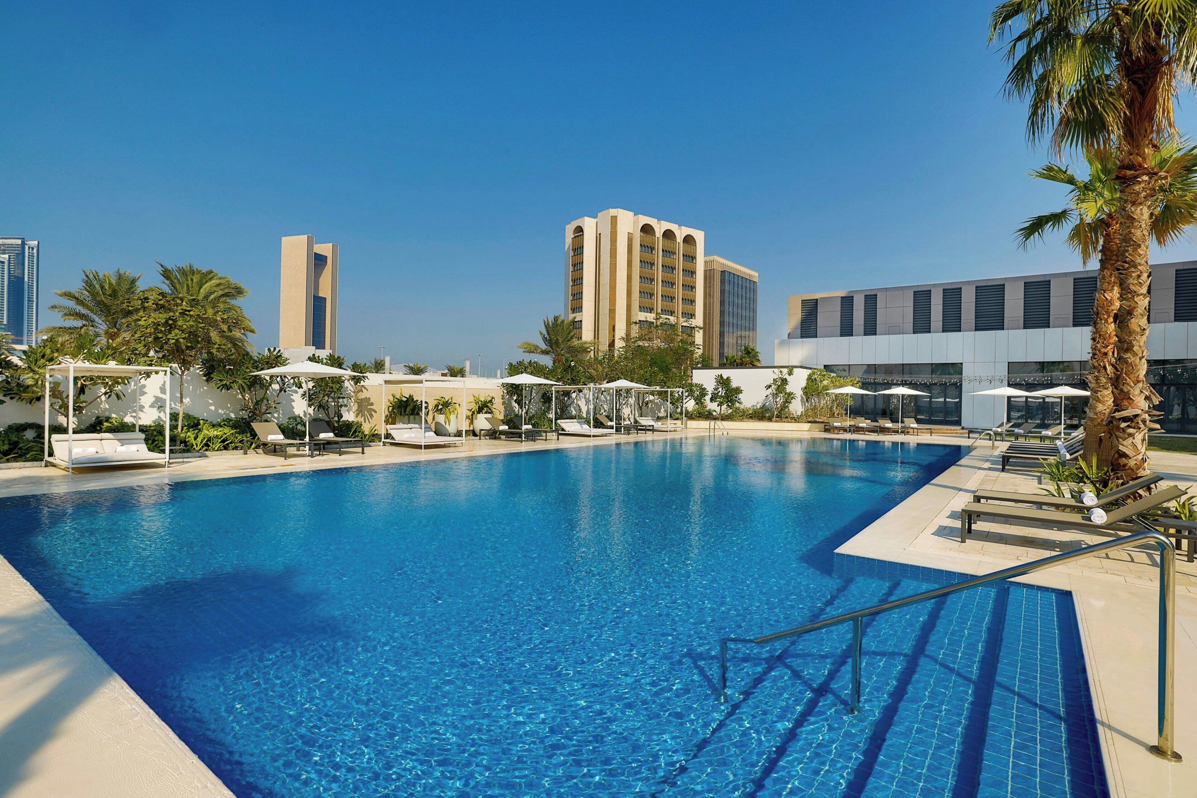 Outdoor pool, pool umbrellas, pool loungers