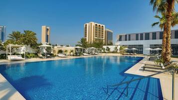 Outdoor pool, pool umbrellas, pool loungers