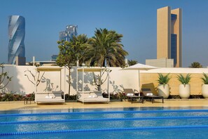 Outdoor pool, pool umbrellas, pool loungers