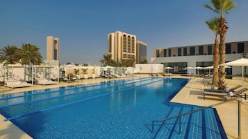 Outdoor pool, pool umbrellas, sun loungers