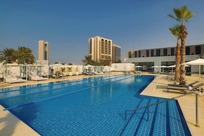 Outdoor pool, pool umbrellas, pool loungers