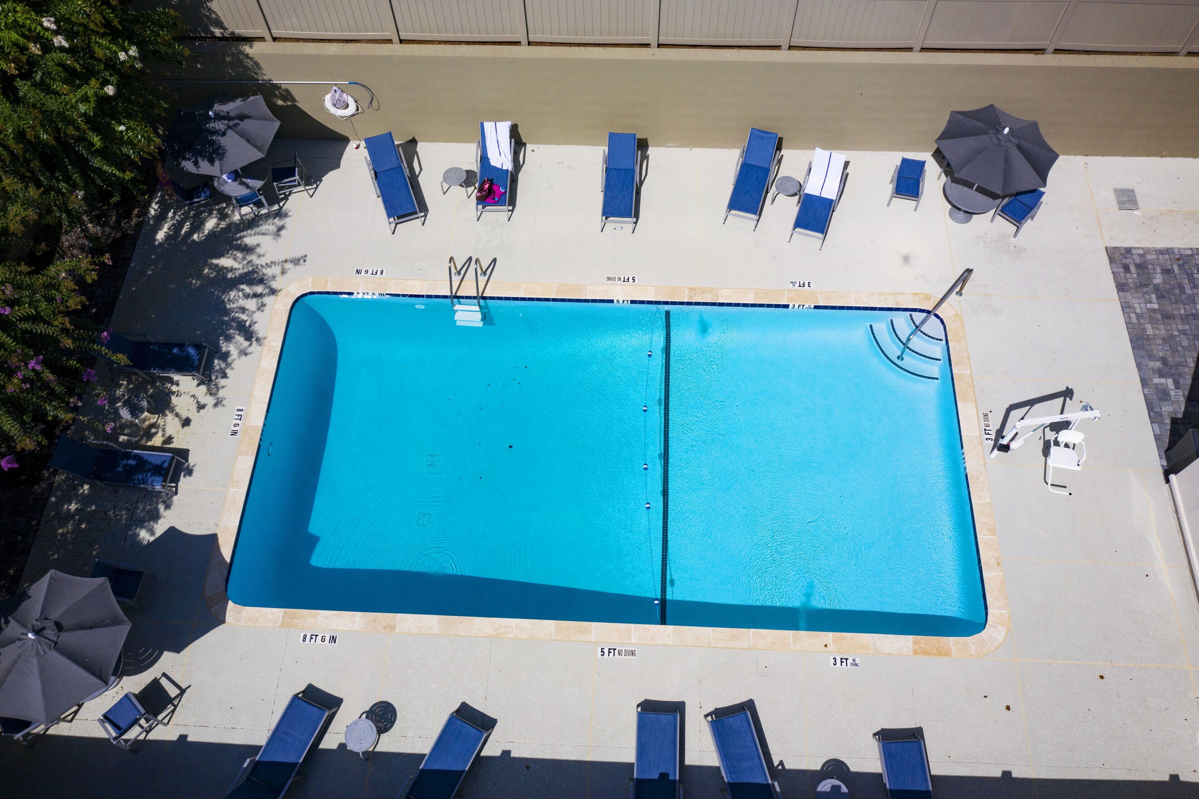 seasonal outdoor pool, open 9 am to 9 pm, pool loungers
