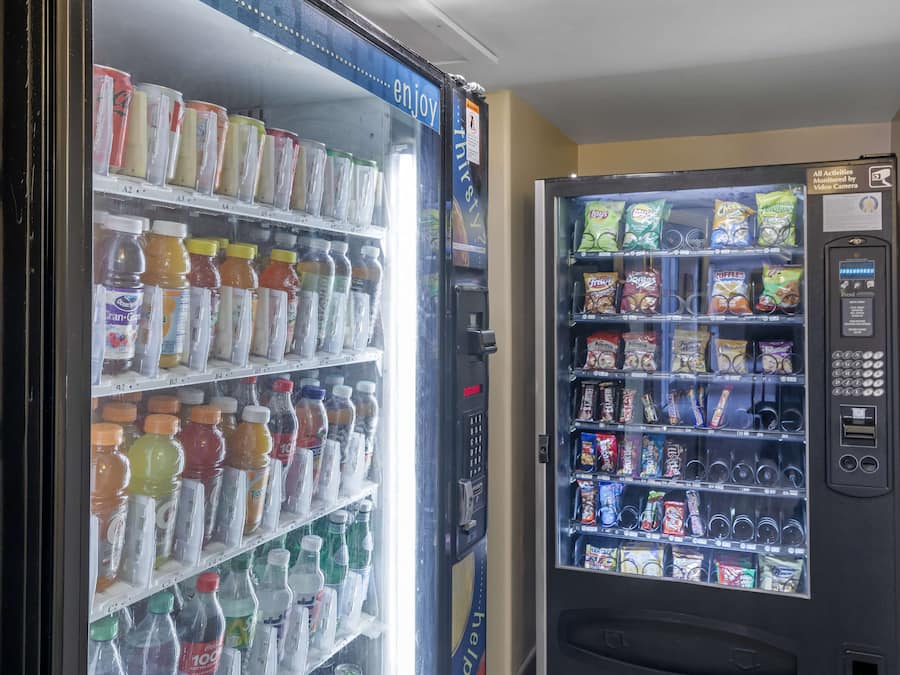 A vending machine stocked with snacks and drinks.