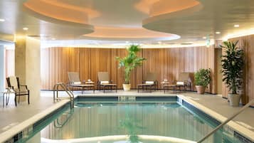Indoor pool, open 9:00 AM to 7:00 PM, pool loungers