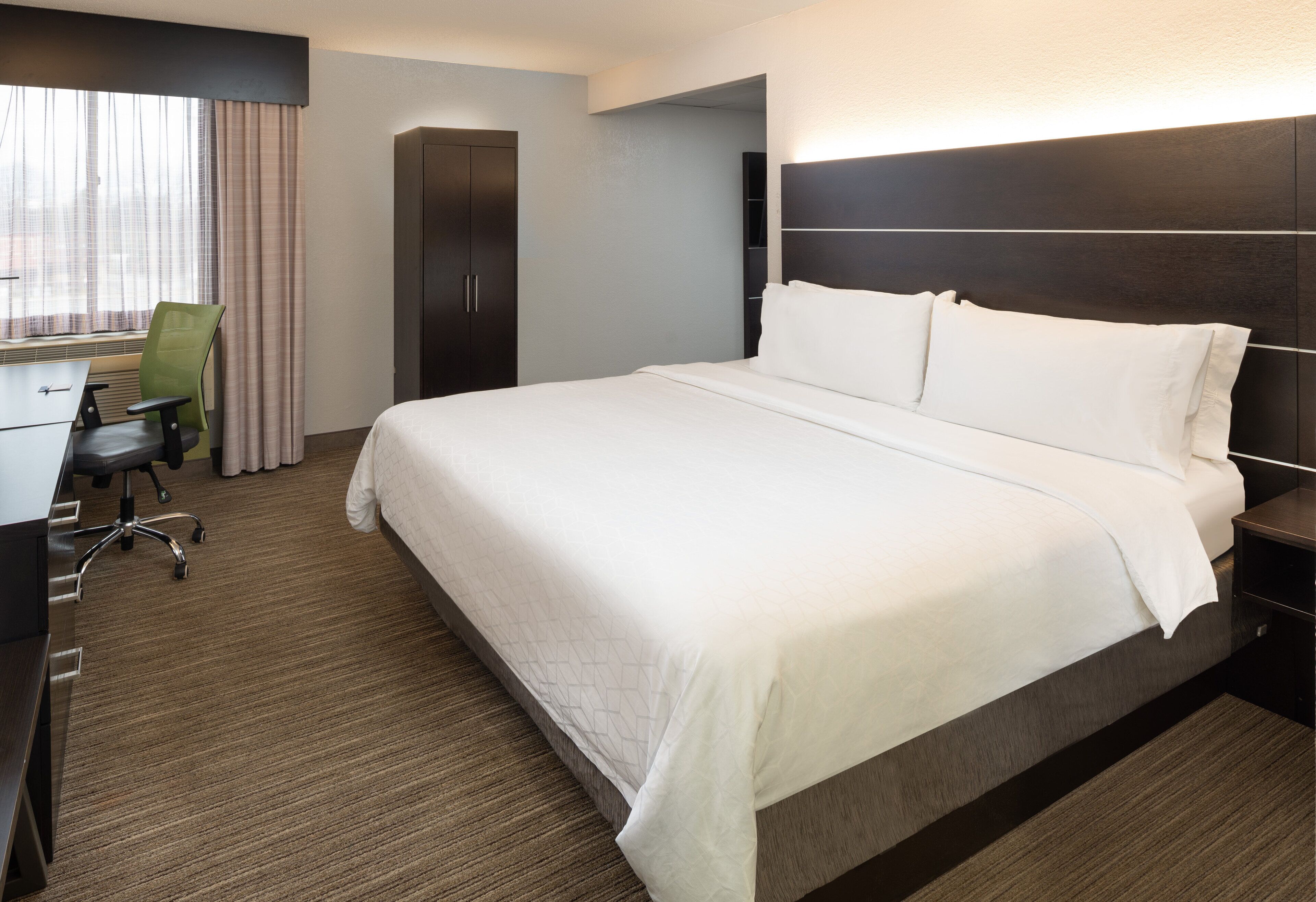 suite, 1 king bed, non smoking | in-room safe, individually furnished, desk, blackout curtains
