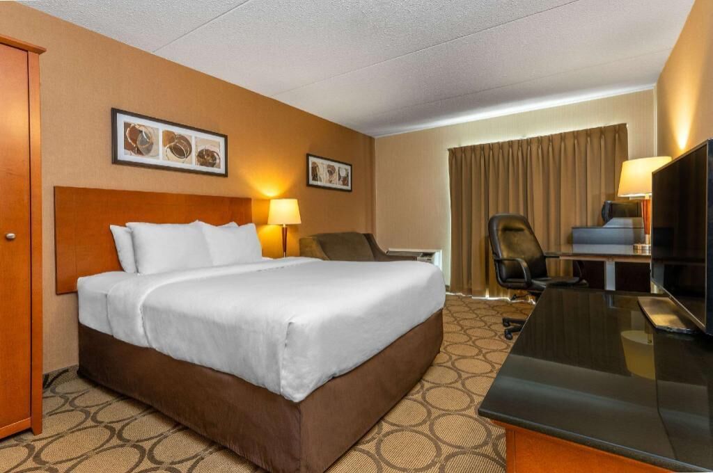 Premium bedding, desk, blackout curtains, iron/ironing board