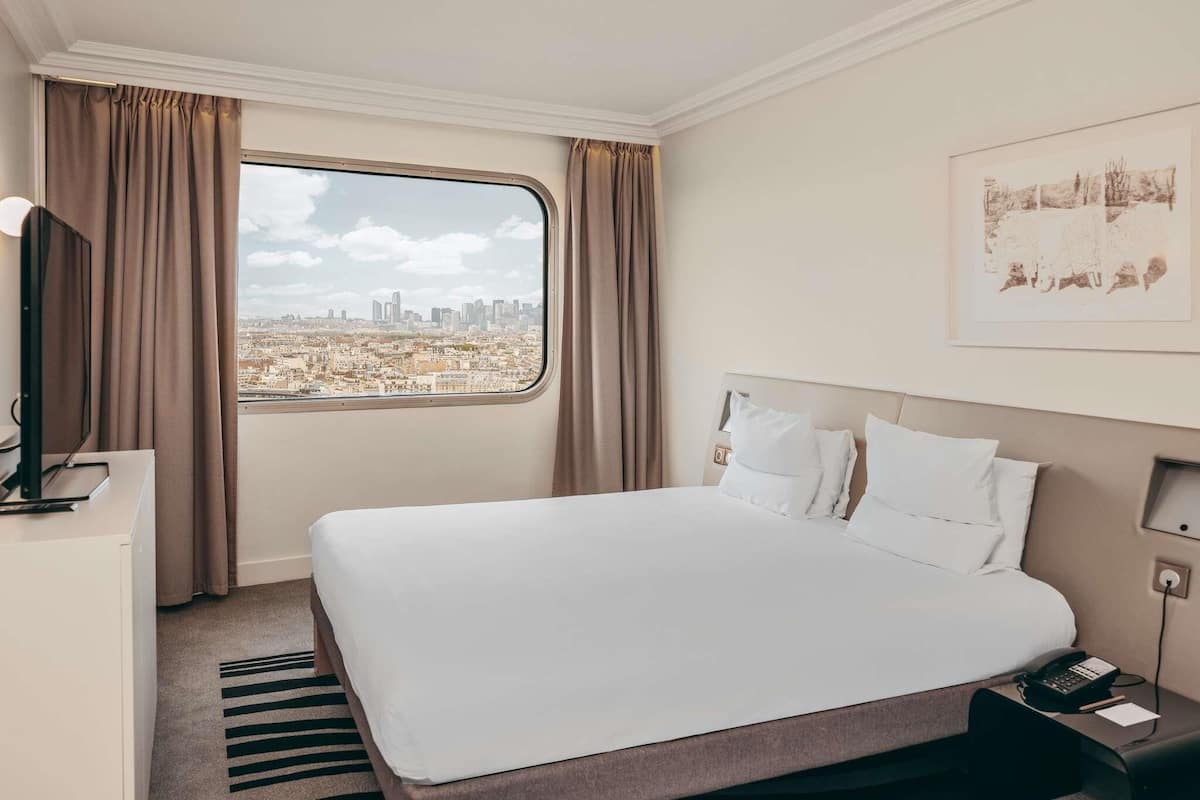 Suite exécutive, 1 grand lit | Literie de qualité, lit avec matelas à plateau-coussin, minibar