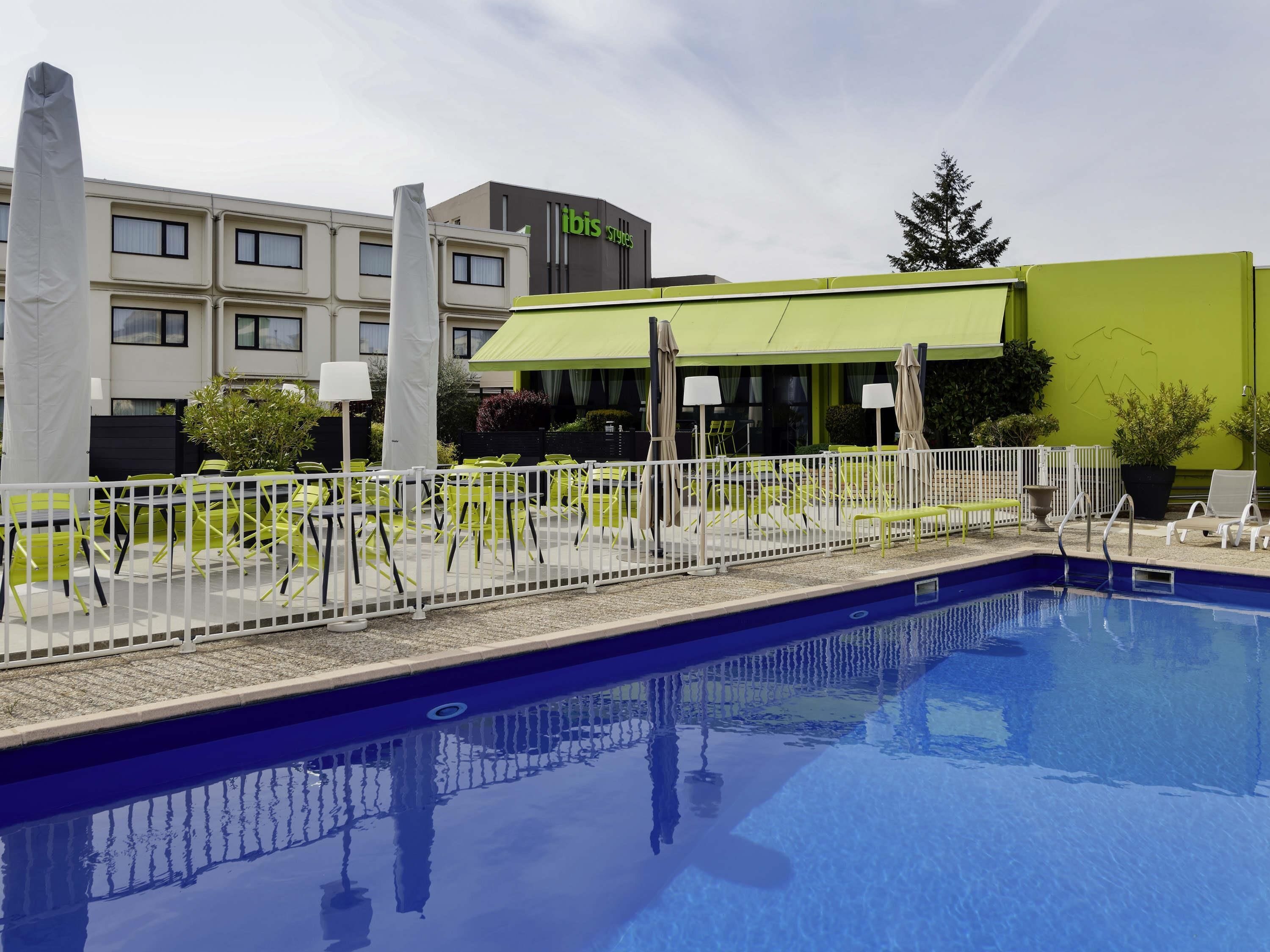 Seasonal outdoor pool, open 10:00 AM to 8:00 PM, pool loungers