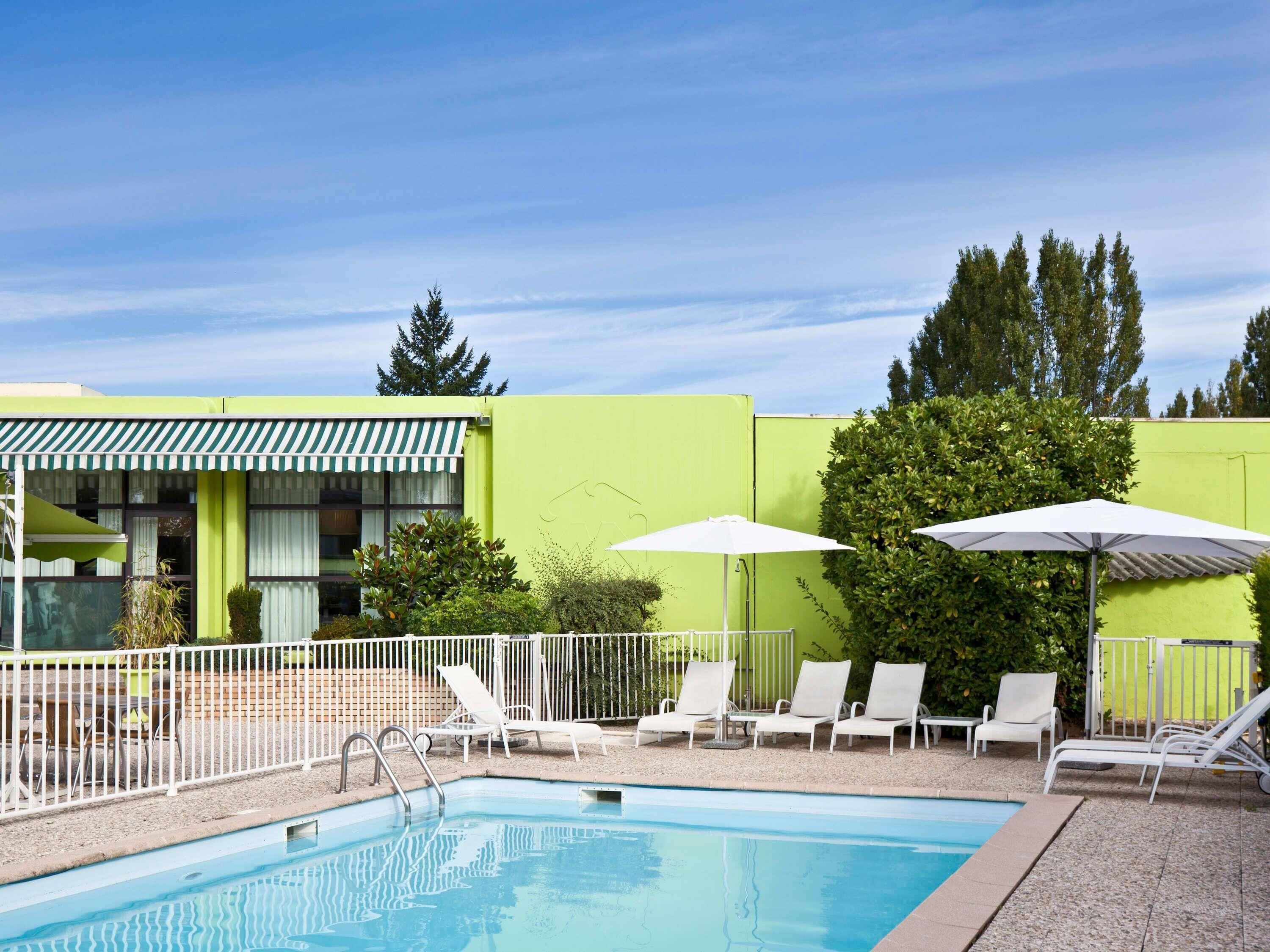 Seasonal outdoor pool, open 10:00 AM to 8:00 PM, pool loungers