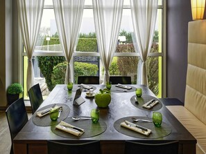 Breakfast, lunch, dinner served; local cuisine 