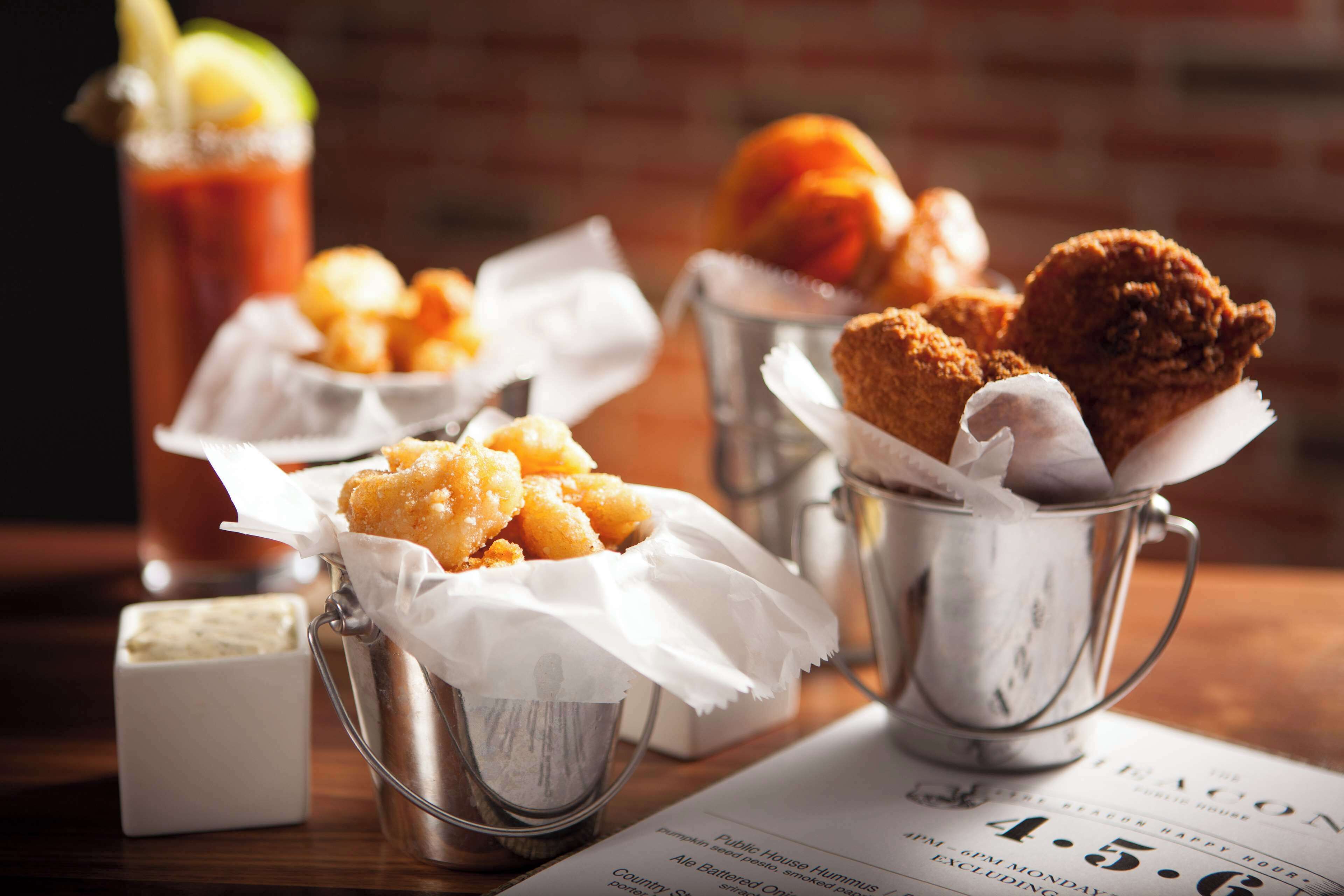 A table with food items and a menu.