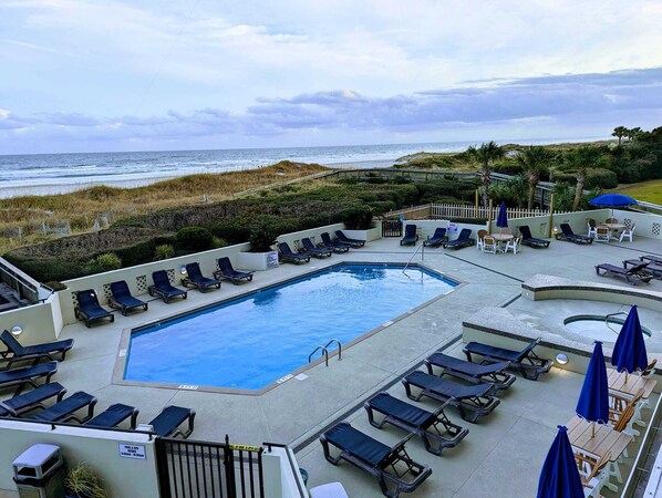 Indoor pool, outdoor pool, pool umbrellas, pool loungers