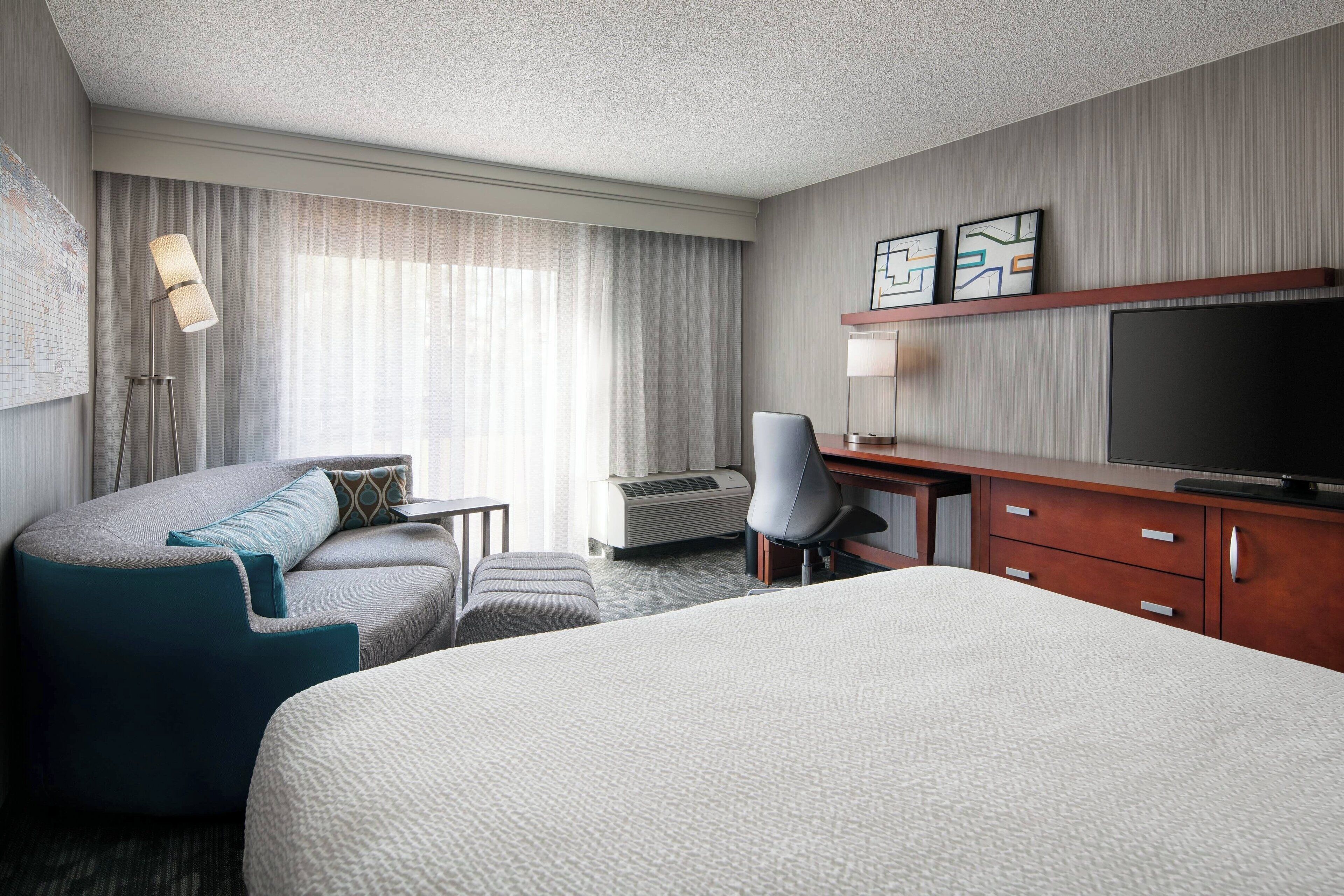 room, 1 king bed with sofa bed, garden view | in-room safe, iron/ironing board, free cots/infant beds, free wifi