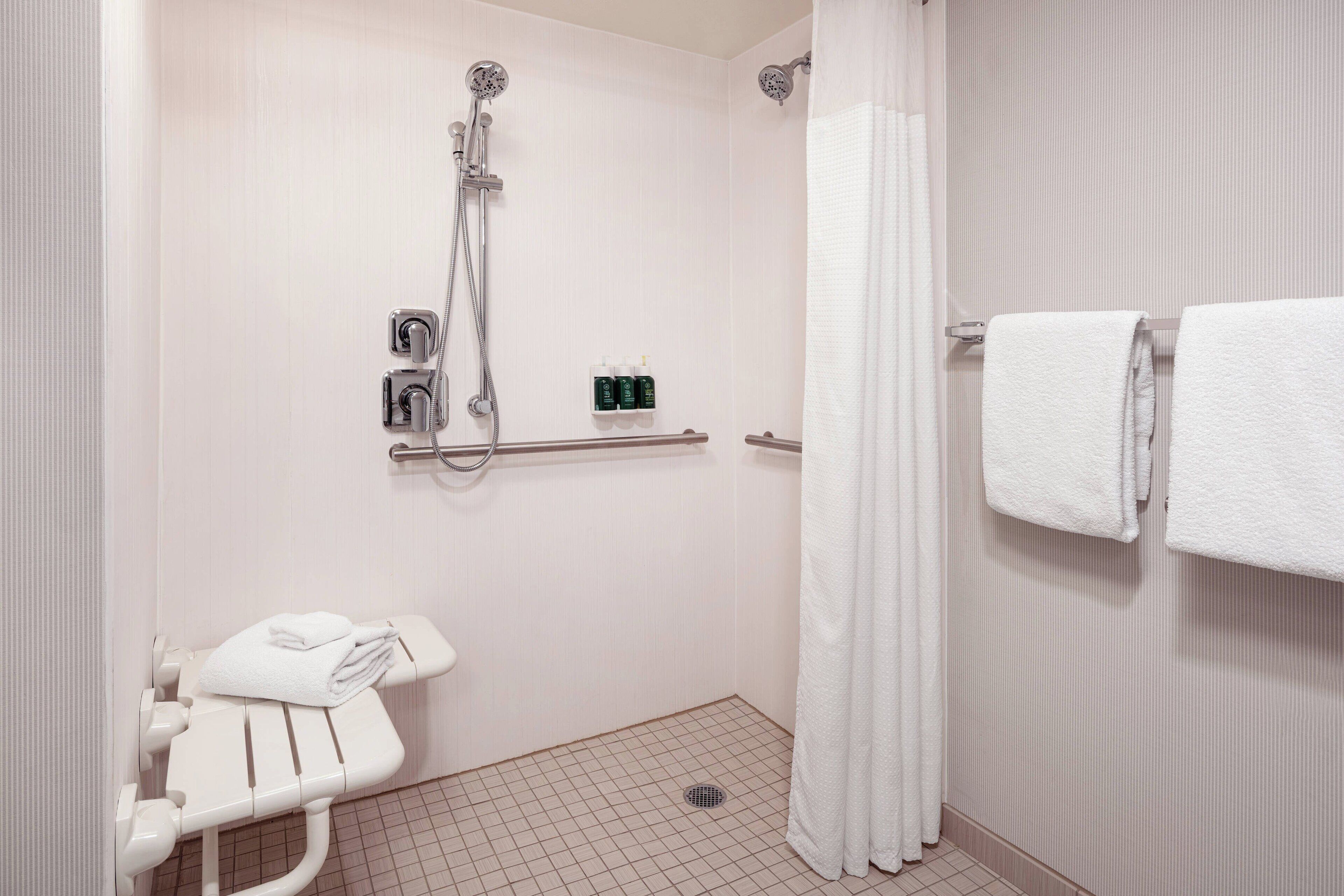 combined shower/bathtub, free toiletries, hair dryer, towels