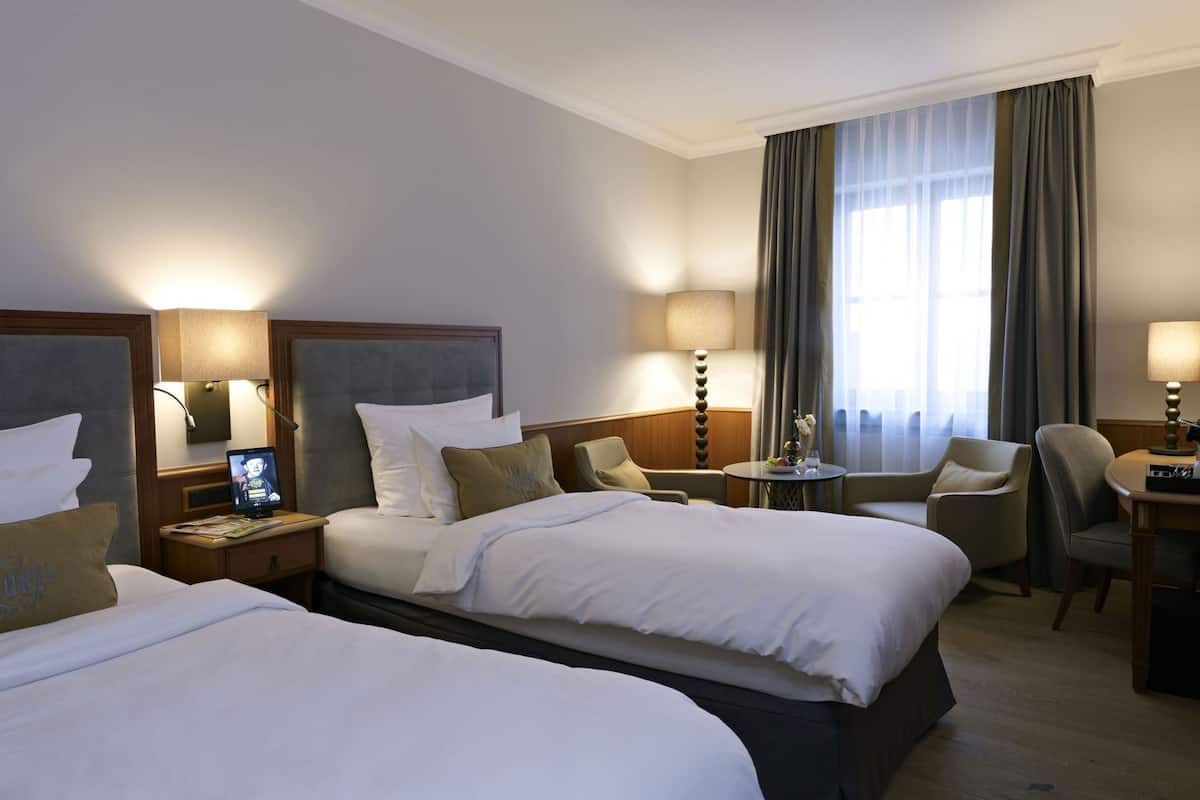 Ropa de cama de alta calidad y minibar