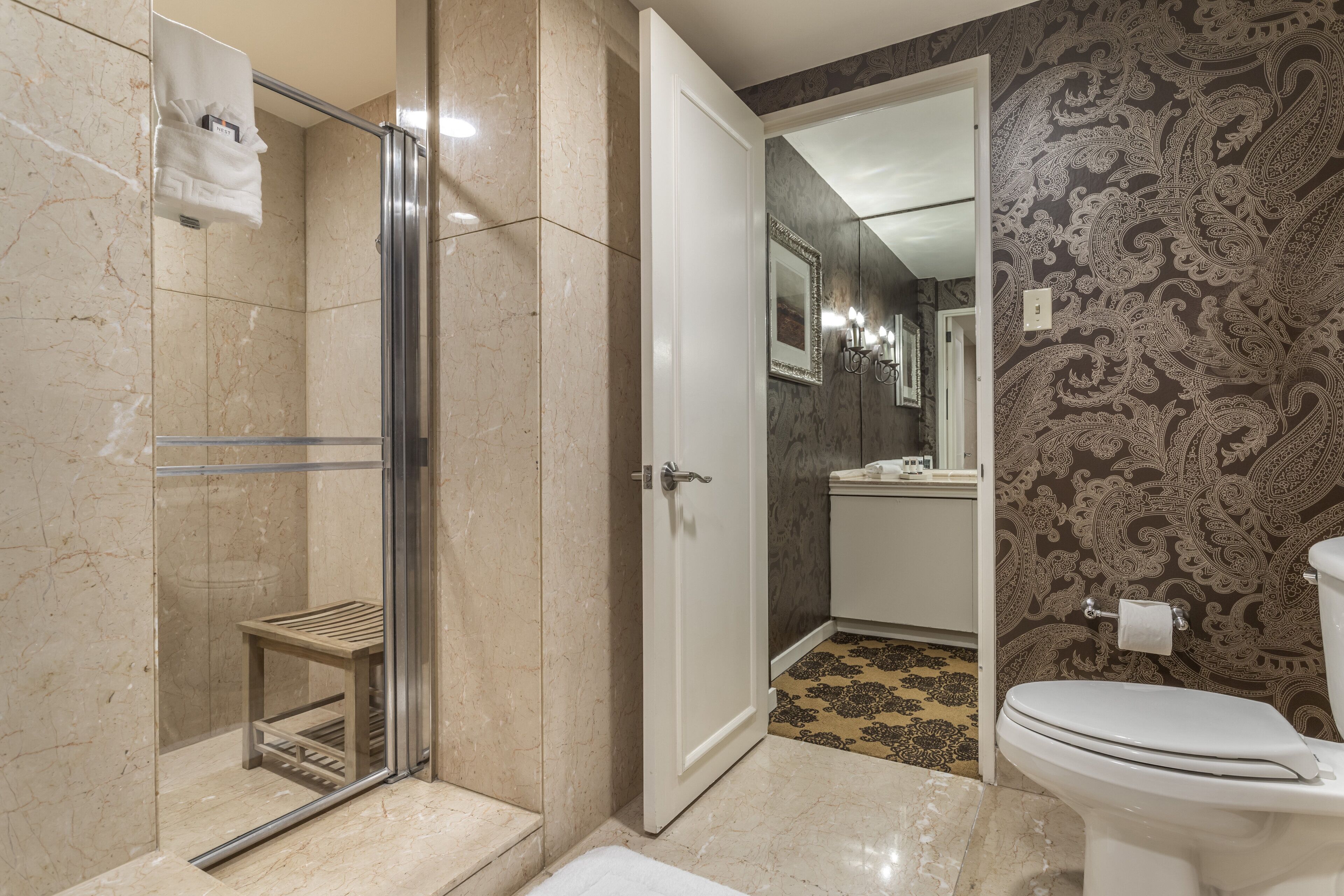 Designer toiletries, hair dryer, bathrobes, slippers