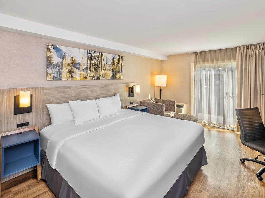 Premium bedding, pillowtop beds, desk, blackout drapes