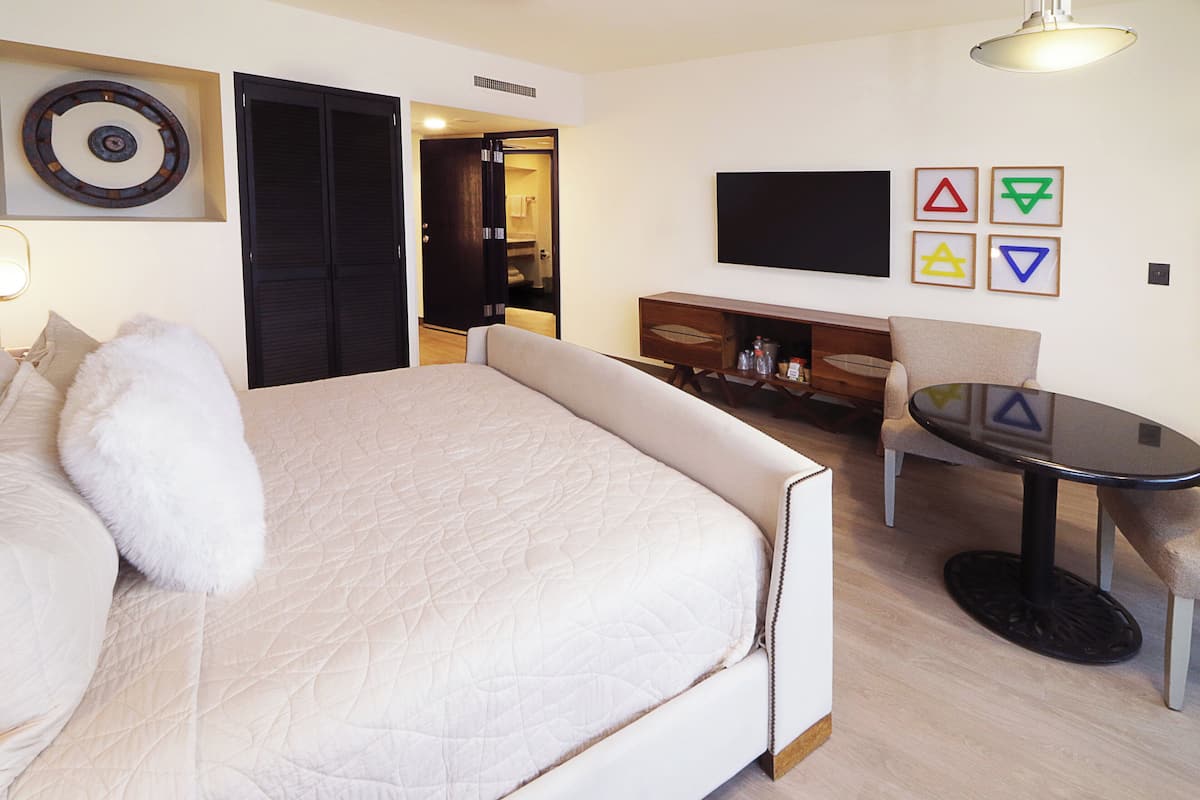 Suite, 1 Bedroom (Dining) | 1 bedroom, down comforters, in-room safe, desk