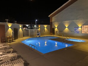 Outdoor pool, open 9:00 AM to 10:00 PM, pool umbrellas, pool loungers