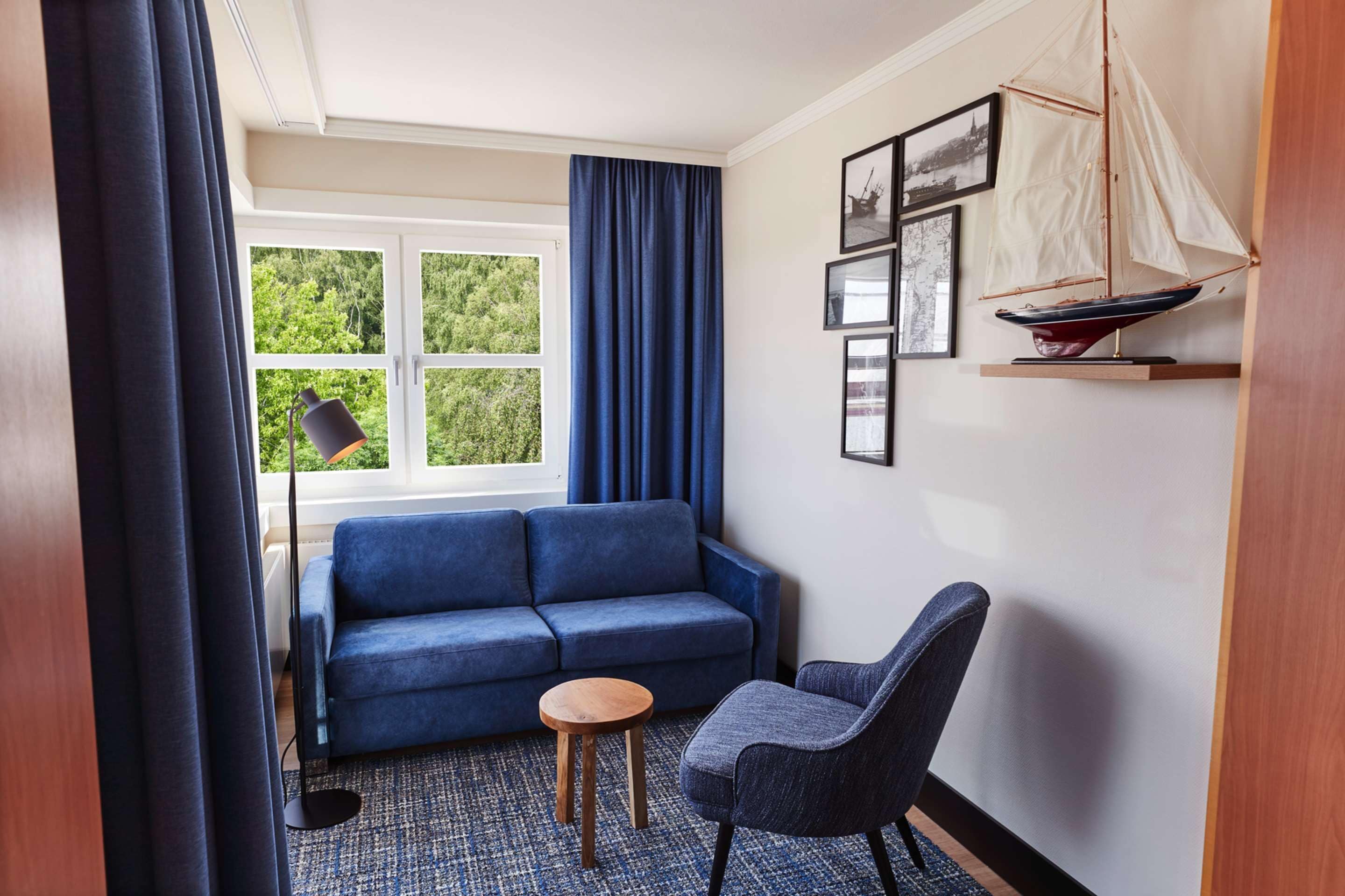 family room | down duvets, minibar, in-room safe, soundproofing