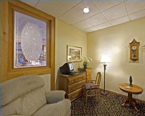 Desk, blackout drapes, iron/ironing board, rollaway beds