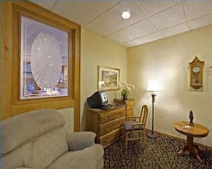 Desk, blackout curtains, iron/ironing board, rollaway beds