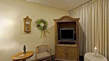 Desk, blackout drapes, iron/ironing board, rollaway beds