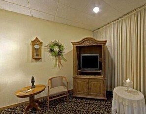 Desk, blackout curtains, iron/ironing board, rollaway beds