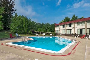 Outdoor pool, pool umbrellas, sun loungers