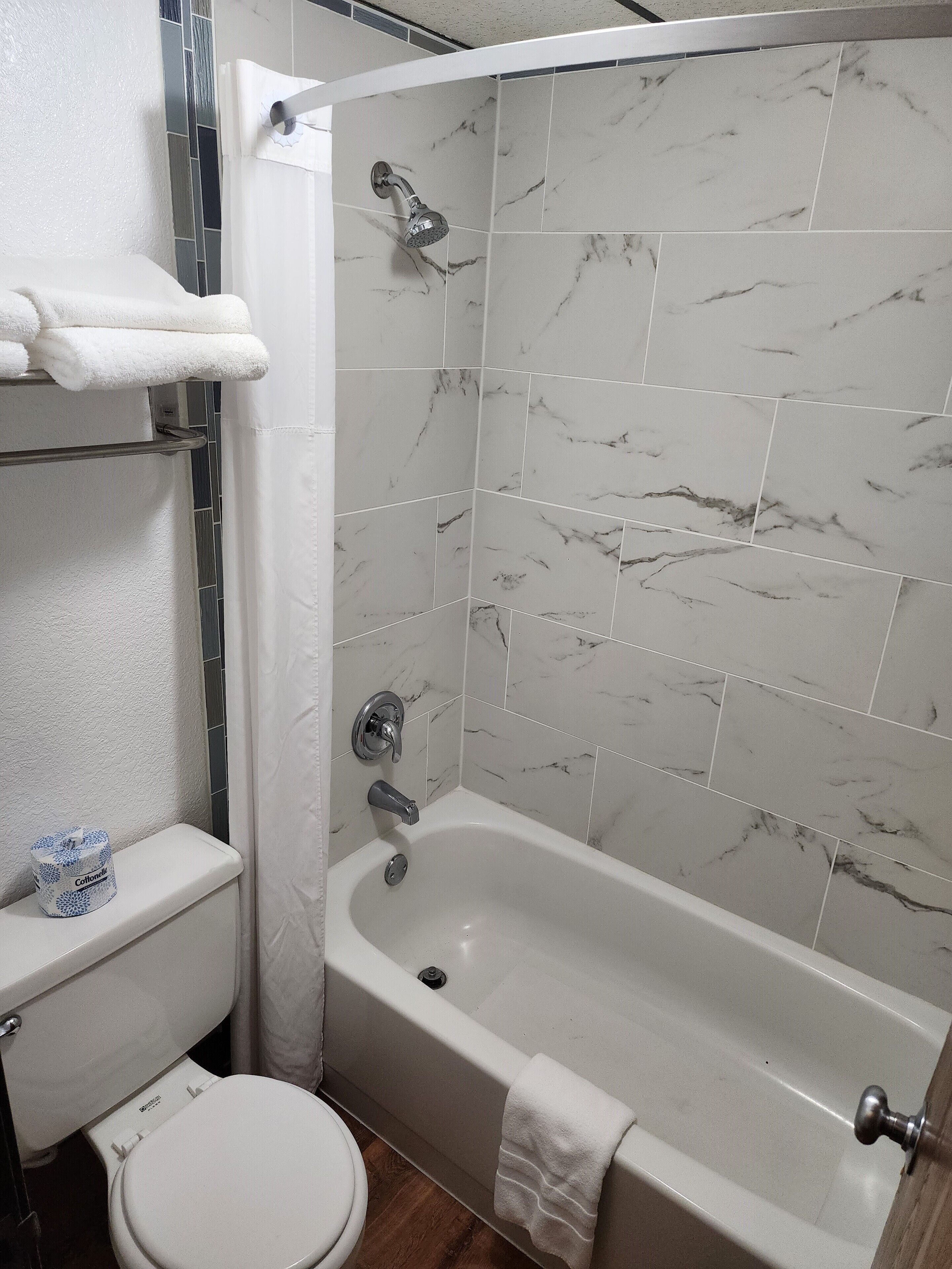 eco-friendly toiletries, hair dryer, towels, soap