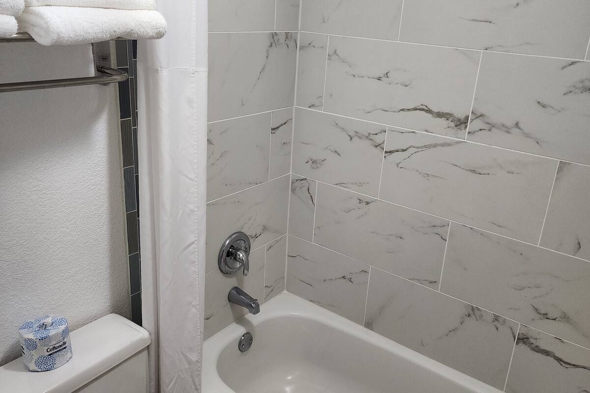 eco-friendly toiletries, hair dryer, towels, soap