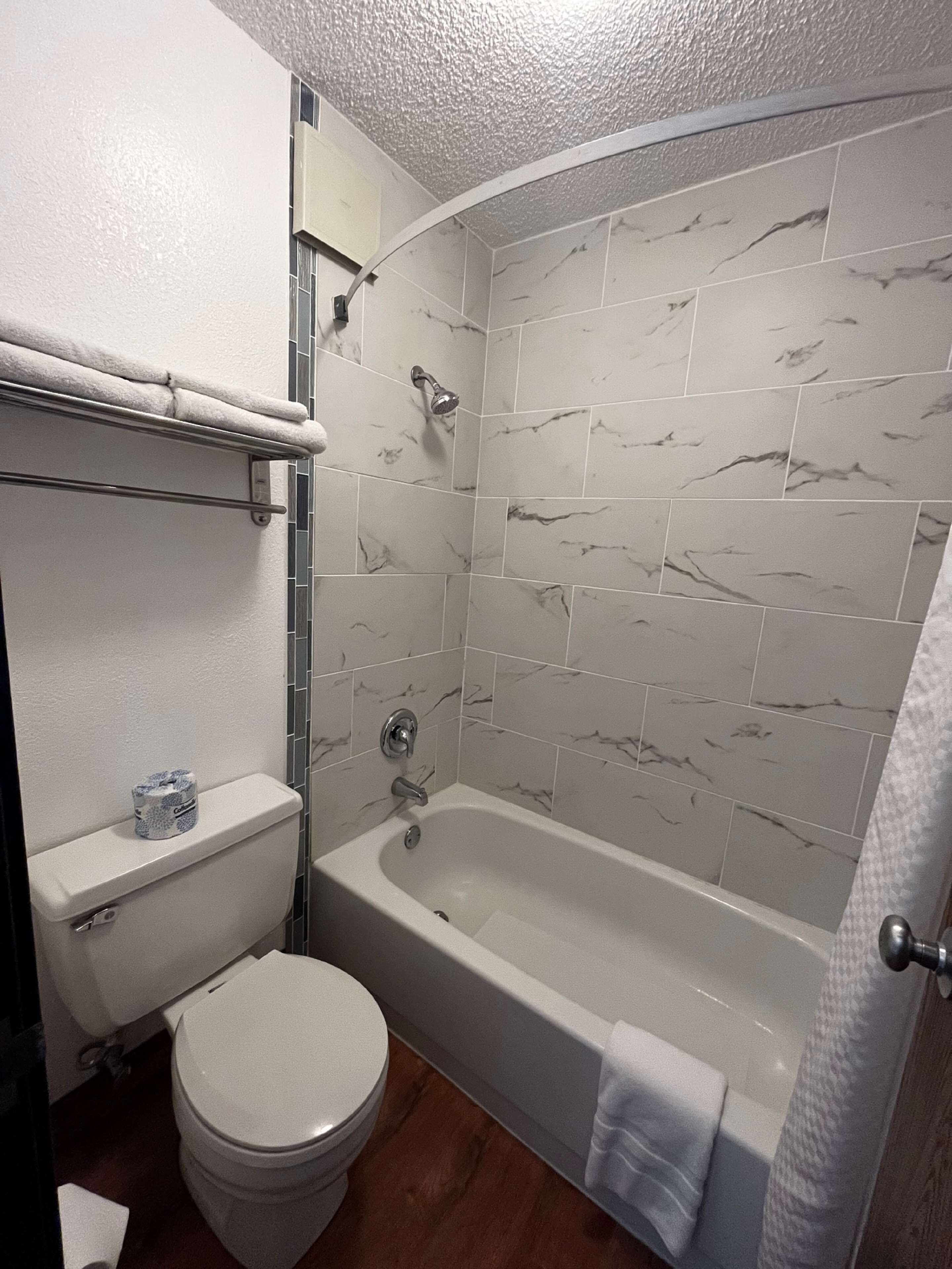 eco-friendly toiletries, hair dryer, towels, soap