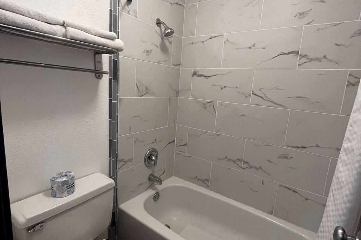 eco-friendly toiletries, hair dryer, towels, soap