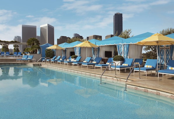 Outdoor pool, open 7:00 AM to 9:00 PM, pool cabanas (surcharge)