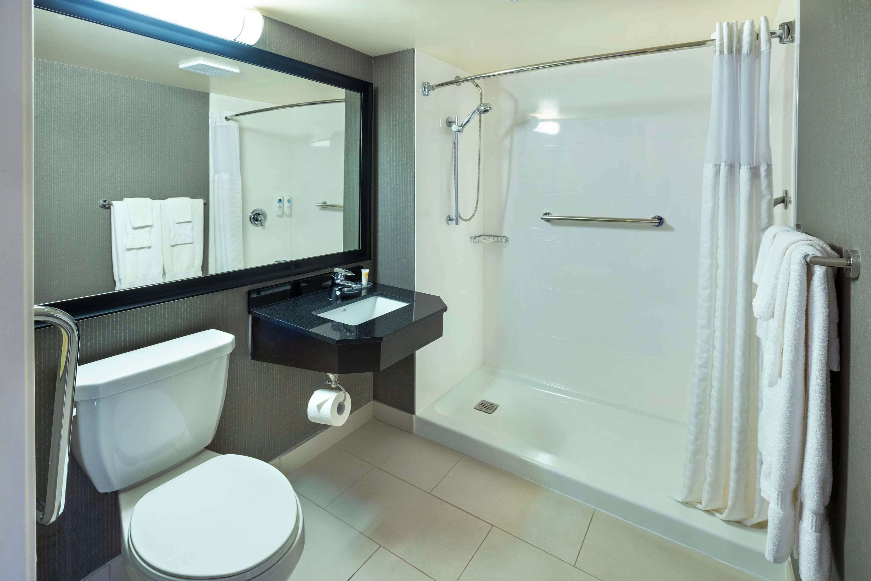 premium bedding, pillow-top beds, desk, blackout curtains