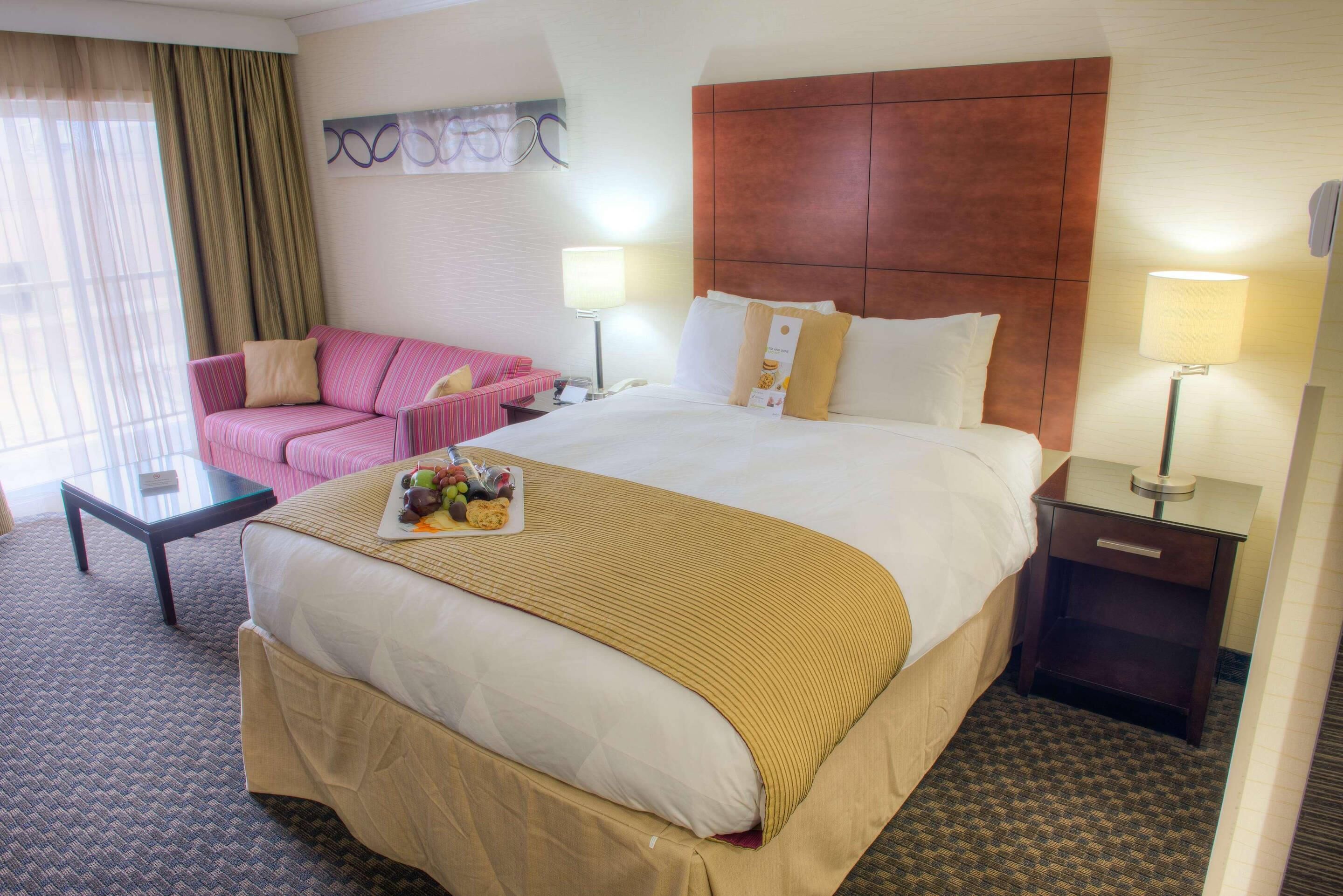 Premium bedding, desk, blackout curtains, soundproofing