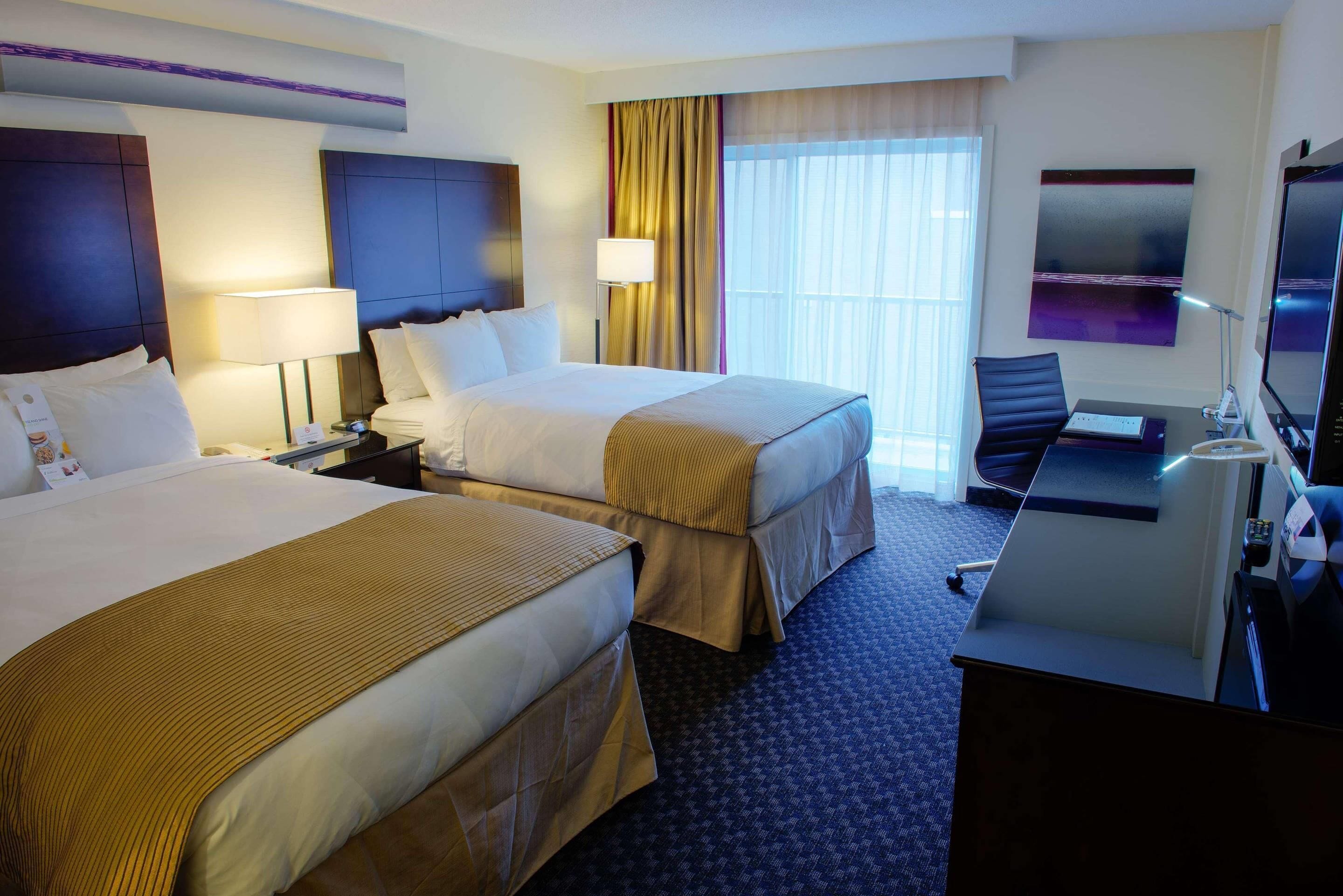 Premium bedding, desk, blackout curtains, soundproofing