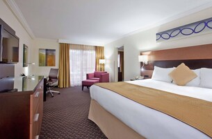 Premium bedding, desk, blackout drapes, soundproofing