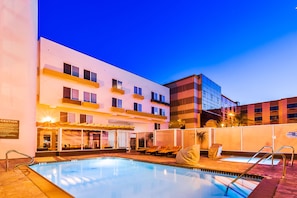 Outdoor pool, open 8:00 AM to 9:00 PM, pool loungers