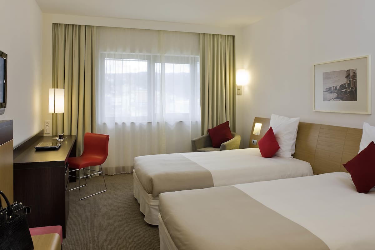 Superior Room, 2 Twin Beds | Minibar, in-room safe, desk, laptop workspace