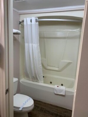 Suite, 1 King Bed | Bathroom | Combined shower/bathtub, free toiletries, towels - Days Inn by Wyndham Clinton (Clinton)