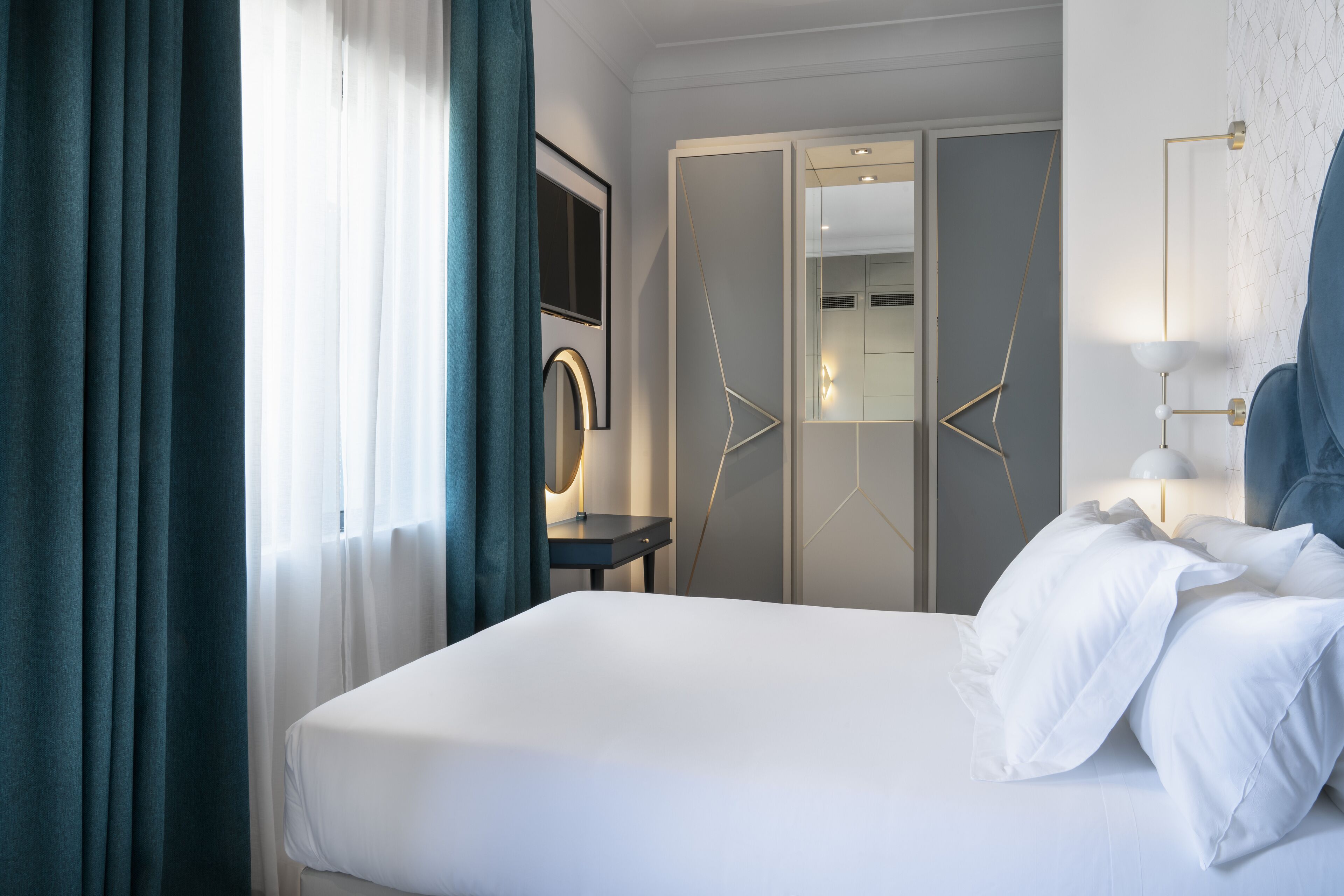 Premium bedding, down duvets, minibar, in-room safe