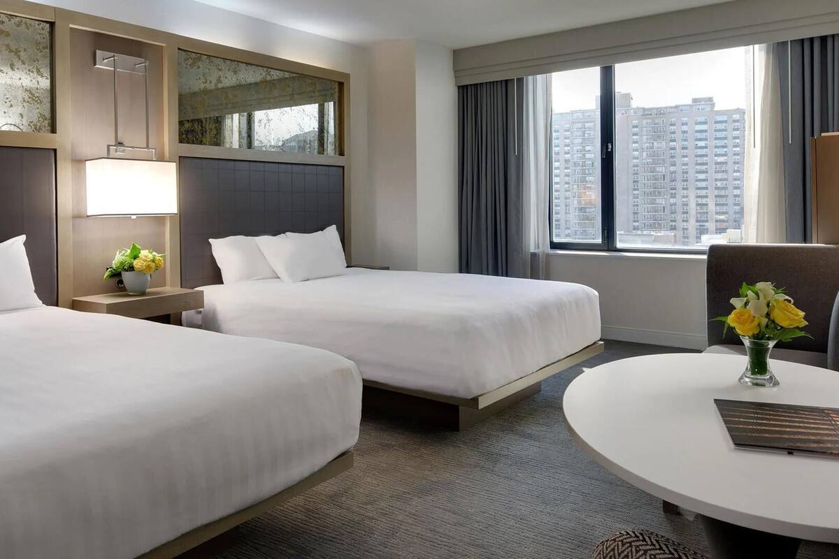 Premium bedding, down comforters, in-room safe, blackout drapes