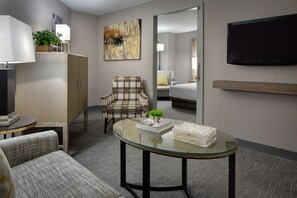 Junior Suite | Living area | 55-inch flat-screen TV with cable channels, TV, pay movies
