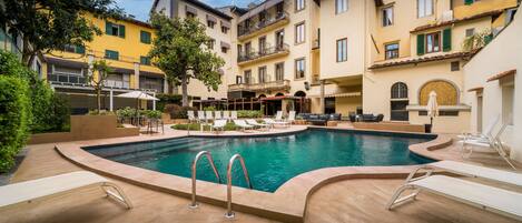 Seasonal outdoor pool, open 8:00 AM to 8:00 PM, sun loungers