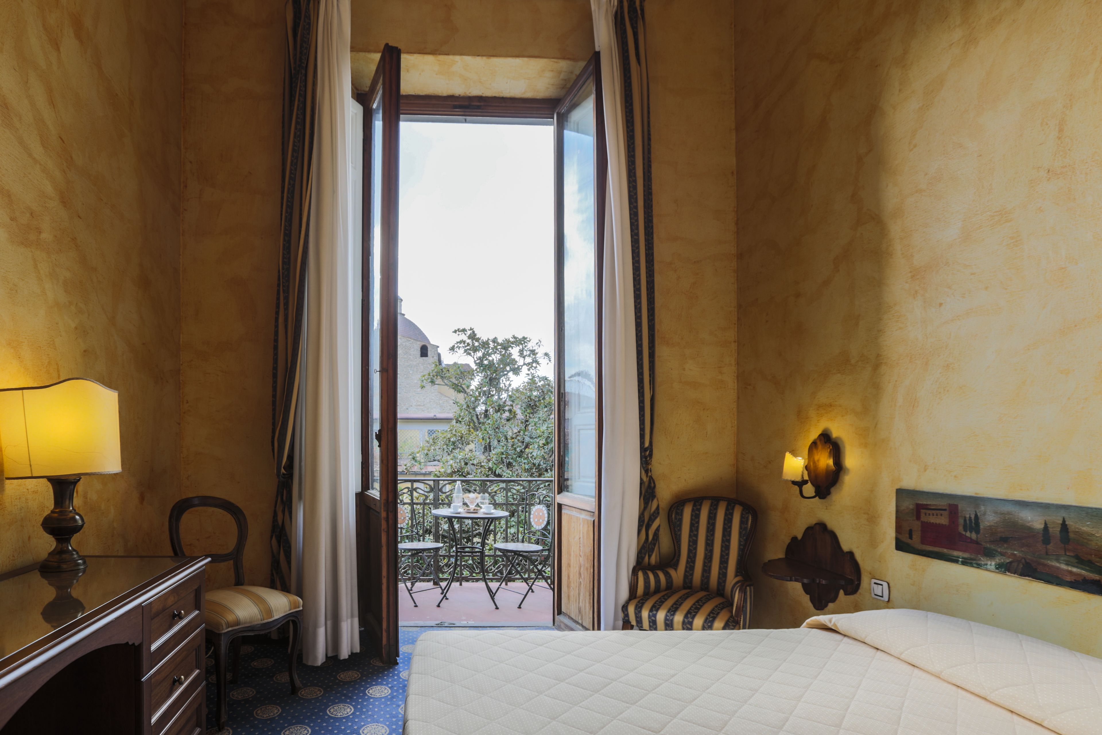 double or twin room, garden view | minibar, in-room safe, desk, iron/ironing board