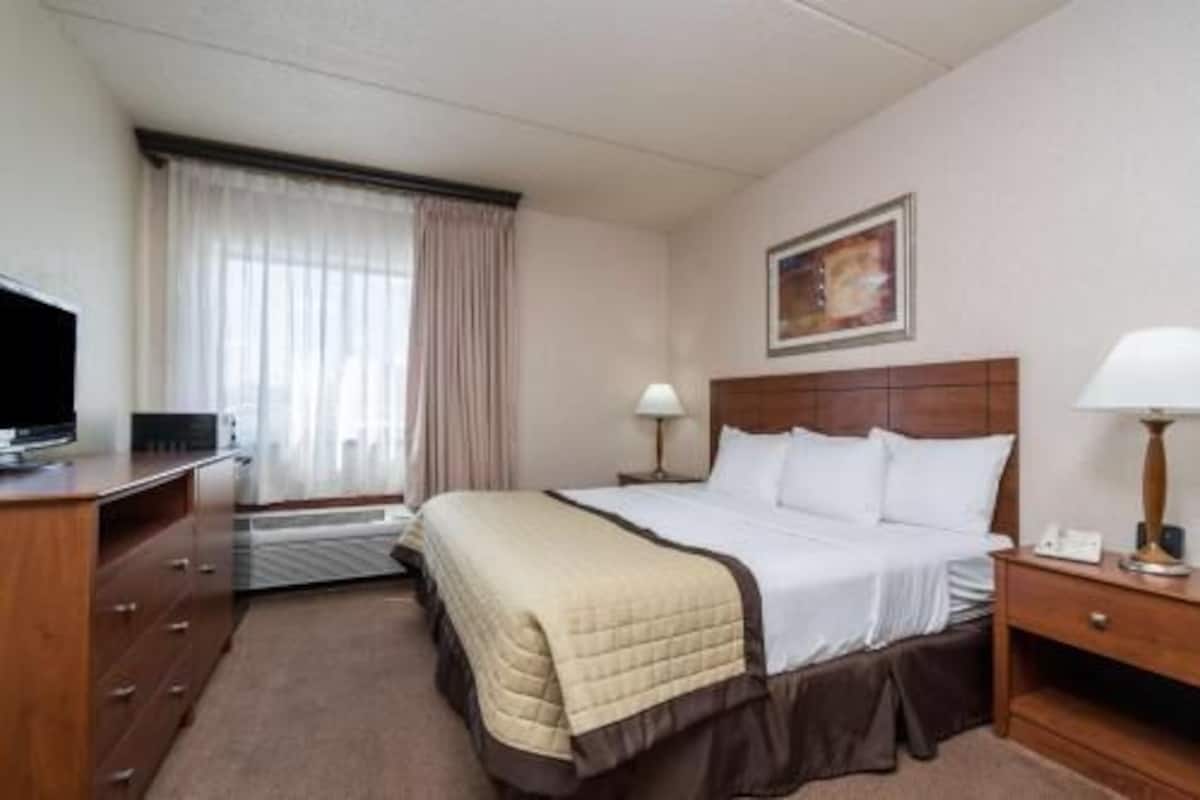 Individually furnished, desk, laptop workspace, blackout drapes