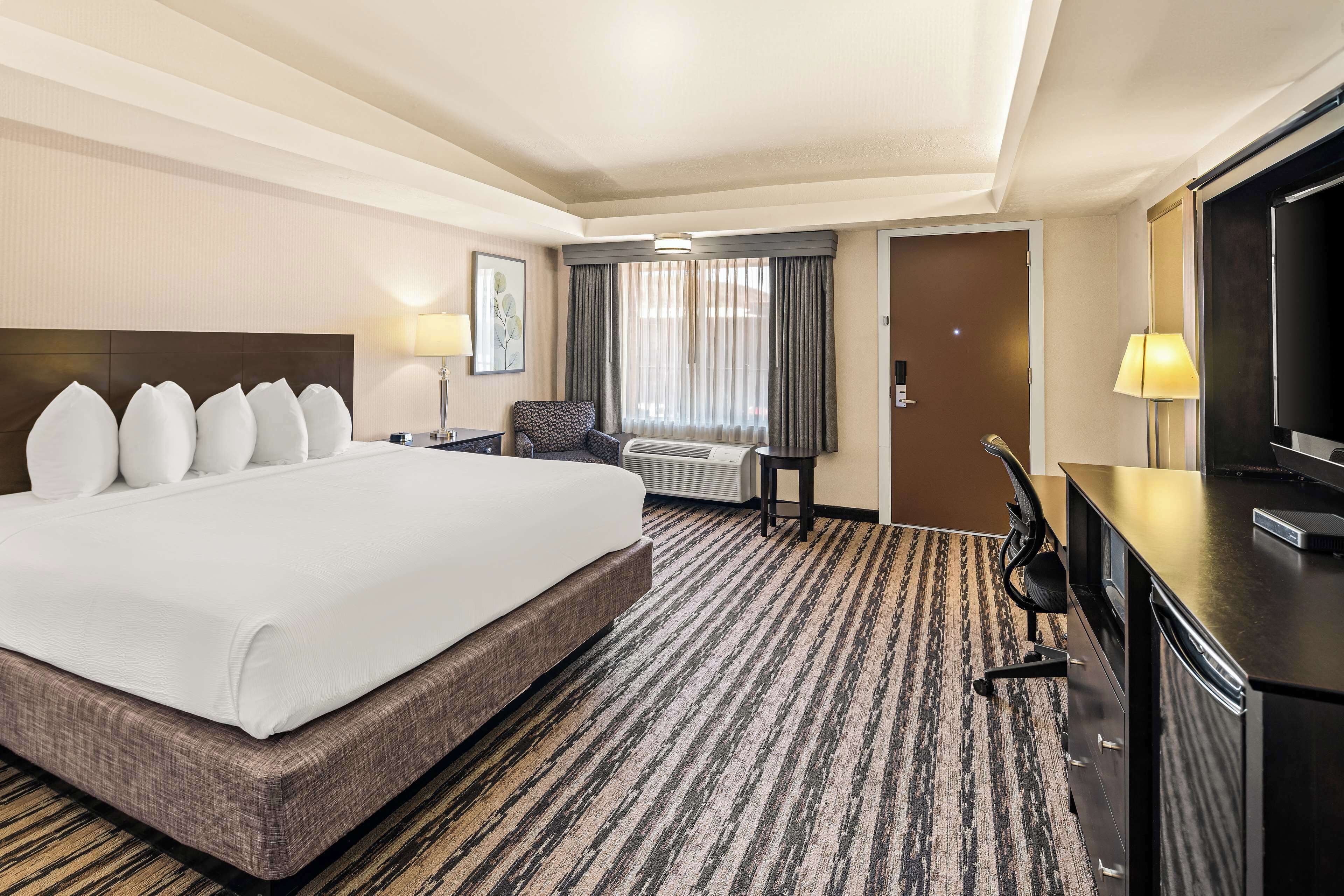 pillow-top beds, desk, blackout curtains, iron/ironing board