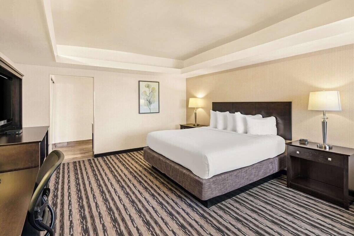 Pillowtop beds, desk, blackout drapes, iron/ironing board